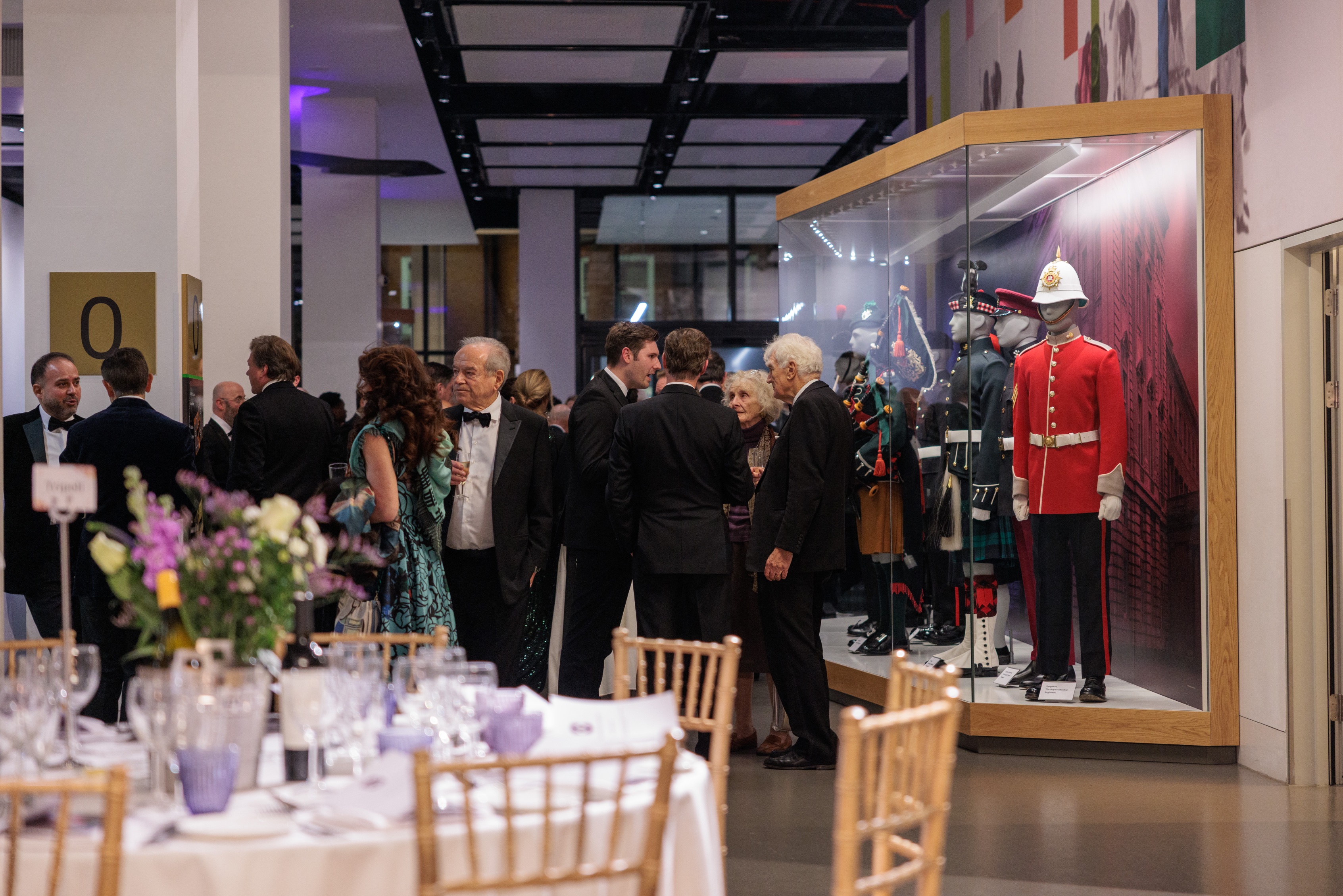 Guests in conversation before dinner